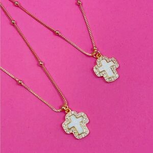 The 𝗠𝗘𝗚 cross necklace